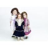 A Simon & Halbig 1079 DEP child doll, with brown sleeping eyes, brown mohair wig, pierced ears,