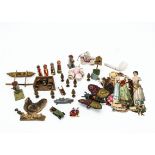 Various small toys, including a clockwork lithographed tinplate butterfly --3 ¼in. (8cm.) long; a