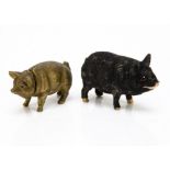 Two German pig candy containers, one black mohair covered cardboard with red paste eyes and