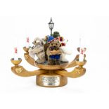 A Steiff limited edition Adventsleuchter, Advent Candelabra, 162 of 1000, 2005 --11 ½in. (29cm.)