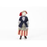 A bisque shoulder head French fisherwoman, the German head with blue painted eyes, blonde painted