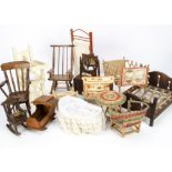 Doll's furniture, a collapsible bed; a chip carved dressing table --9 ½in. (24cm.) high; a rocking