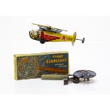 A German lithographed tinplate helicopter spark toy, with push action causing a wheel and blades