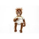 An Ashton-Drake Simon Laurens Baby Babu orangutan, in original box --16in. (41cm.) high