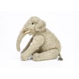 A rare and fine Steiff jointed elephant circa 1908, with grey mohair, black boot button eyes,