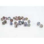 Twenty eight hand worked marbles, probably late 19th century with multi-coloured swirls -2cm. (