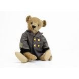 'Rattle' an early Bing teddy bear circa 1909, with blonde mohair, black boot button eyes, replaced