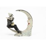 A rare German lead nodder pierrot serenading the moon, probably Hyde, hand painted with tinplate