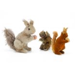 A 1930s Steiff red squirrel, of reddish brown velvet body, mohair tail and ears, black glass eyes,