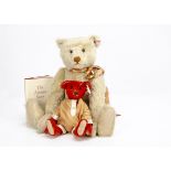 Steiff limited editions for Teddy Bears of Witney, a Xenia, 94 of 1500, 2001; and Baby Alfonzo, 4127