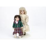 A Max Oscar Arnold 200 Welsh child doll, with blue sleeping eyes, replace brown wig, jointed