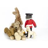 Various British soft toys, a jointed lamb with felt flower in mouth --8in. (20.5cm.) high; a post-