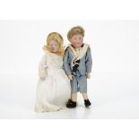 Two restored Kämmer & Reinhardt 114 Gretchen and Hans character dolls, both with blue painted
