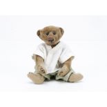 An early Strunz teddy bear circa 1907, with blonde mohair, black boot button eyes, pronounced