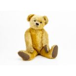 'Farrant' a large Farnell teddy bear late 1930s, with golden mohair, orange and black glass eyes,