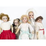 Five small German bisque headed dolls, a shoulder-head doll marked 2 with solid domed head, fixed