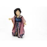 A Simon & Halbig 1329 Oriental child doll, with brown almond shaped sleeping eyes, pierced ears,