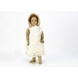 A rare J Roger Gault La Plastolite bebe, with fixed blue glass eyes, brown mohair wig, solid jointed