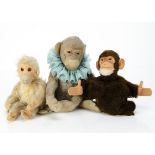 A Steiff pre-war chimpanzee, with faded brown mohair, clear and black glass eyes with brown backs,