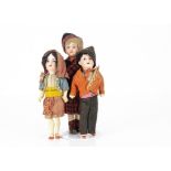 A pair of Armand Marseille 390 child dolls, dressed as Indians, fixed ark eyes, black mohair wig,