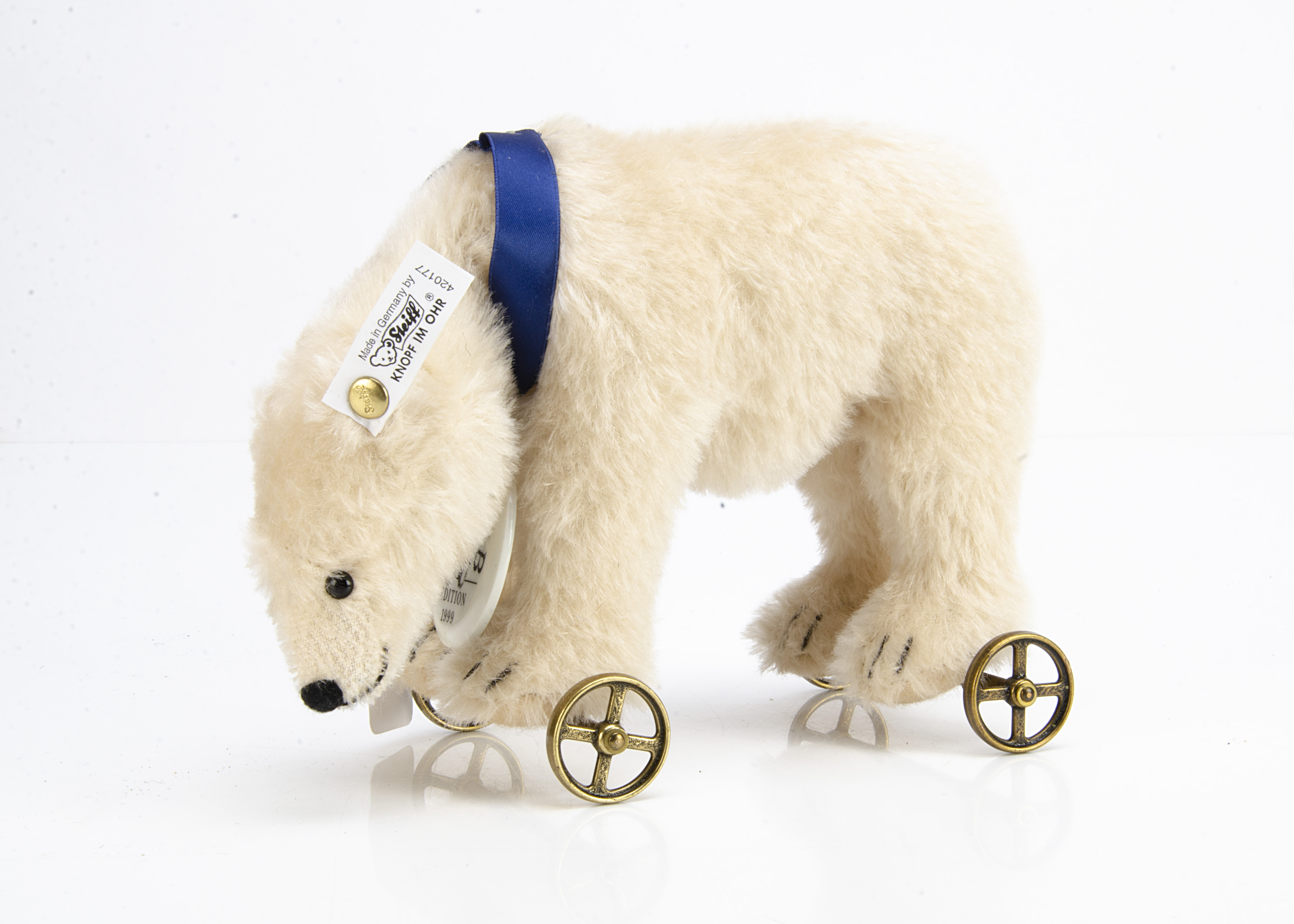 A Steiff limited Club edition Polar Bear on wheels 1910, 4635 for 1999/2000, in original box with