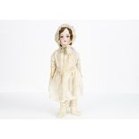 An Armand Marseille 390 child doll, with blue sleeping eyes, brown mohair wig, jointed composition