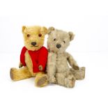 Two post-war Chiltern teddy bears, with golden mohair, replaced glass eyes, muzzle with black