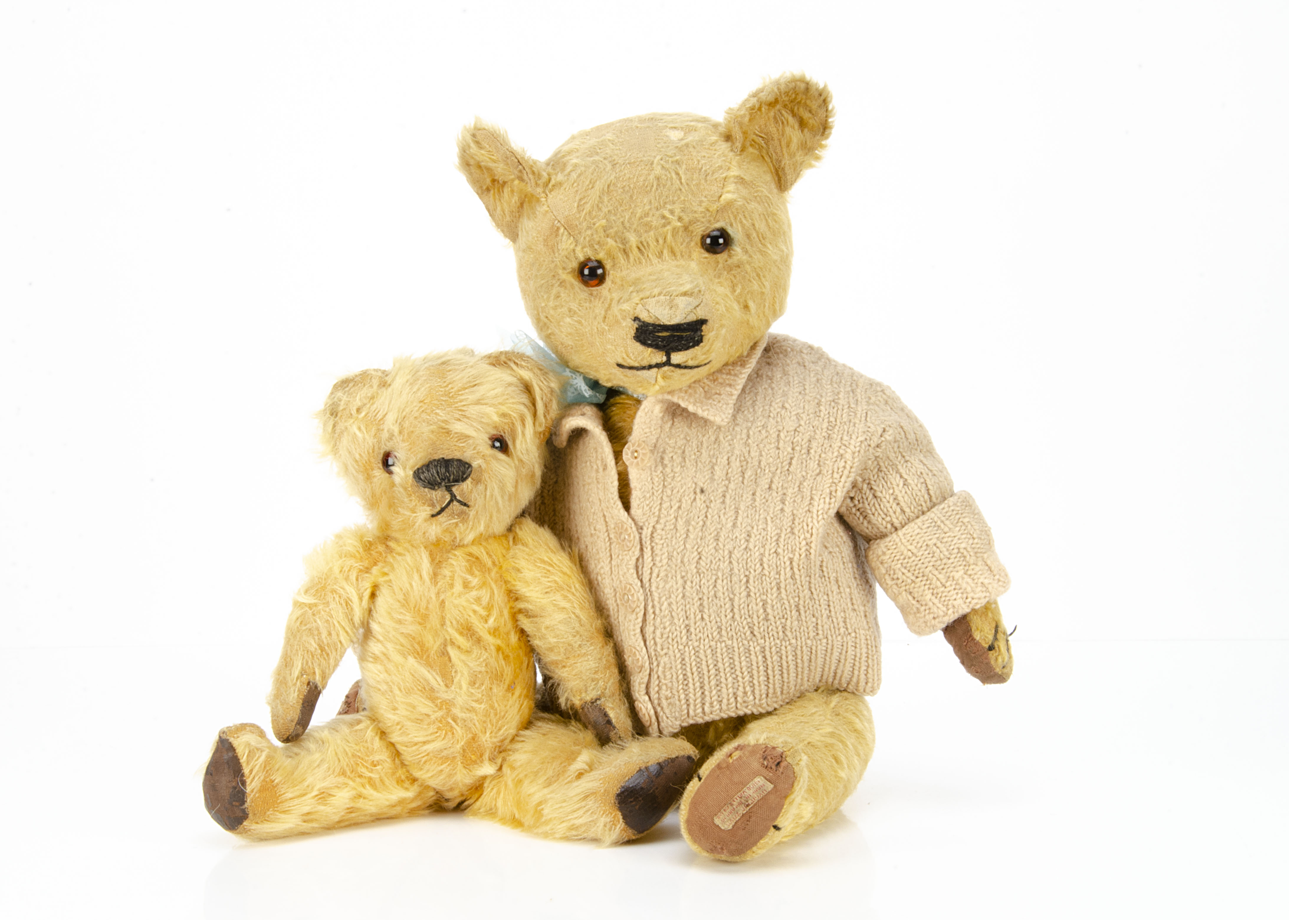 A Chad Valley Magna type teddy bear 1930s, with golden mohair, replaced glass eyes, muzzle with