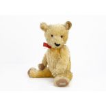 'Bertie' a Chad Valley Magna teddy bear 1930s, with golden mohair, orange and black glass eyes,