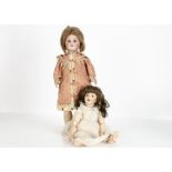 A DEP child doll, with lashed blue sleeping eyes, pierced ears, brown mohair wig, jointed papier-