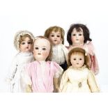 Five German bisque headed child dolls, an Armand Marseille Mabel shoulder-head doll with kid