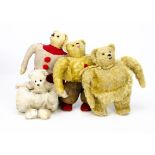 Four unusual teddy bears, a replica of a Strunz muff teddy bear --13in. (33cm.) high; two other
