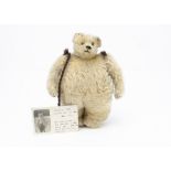 A rare Strunz teddy bear muff with provenance circa 1912, with blonde mohair, black boot button