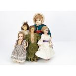 Five German wax over composition dolls, a shoulder-head lady doll with blue inset glass eyes, blonde