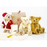 Four yellow tagged Steiff teddy bears, a Father Christmas teddy bear --10 ½in. (26.5cm.) high; two