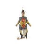 A late 19th century carved wooden Jumping Jack clown, double sided painted white, red, yellow and