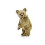 A rare German bear cub candy container 1920s, composition with blonde mohair covering, opaque white,