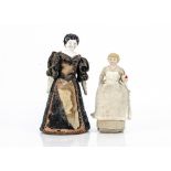 Two doll pin cushions, a bisque shoulder-head doll in nurses uniform --6 ½in. (16.5cm.) high; and