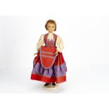 A Bonomi Italian plastic doll, with blue flirting sleeping eyes, auburn hair and Danish