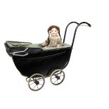 An Armand Marseille 971 character baby, with brown sleeping eyes, brown mohair wig, bent-limbed