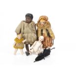 A French Lilliputian black dolls' house doll, with black painted hair, socket head with stringing