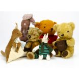 Winnie the Pooh and friends, a Merrythought 1960s Winnie --12 ½in. (32cm.) high (missing t-shirt);