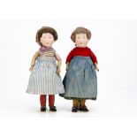 A very rare pair of Armand Marseille intaglio eyed character twin dolls size 4, both with blue
