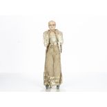 A mid 19th Century English dipped wax over papier-mâché shoulder-head doll, with fixed blue glass