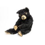 'Blackie' a rare Dean's Rag Book Co Ltd Tru-to-Life black bear circa 1956, with black mohair,