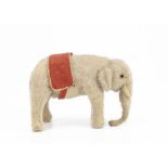 A small German mohair elephant 1910-20s, similar to Steiff with grey mohair, black boot button