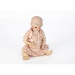 An Alt Beck & Gottschalck 1321 character baby, with brown painted eyes, open/closed mouth, blonde