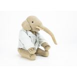 A rare German grey burlap jointed elephant circa 1907, possibly Strunz or similar to Steiff with
