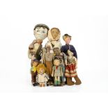 An interesting group of dolls, mainly cloth including double faced boy and girl Tyrol child --7 ¼in.