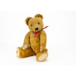 A good Merrythought teddy bear 1950s, with dark golden mohair, orange and black glass eyes,